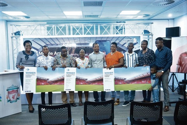 Mrs Yvonne Gyebi (left) with the top three winners and their families