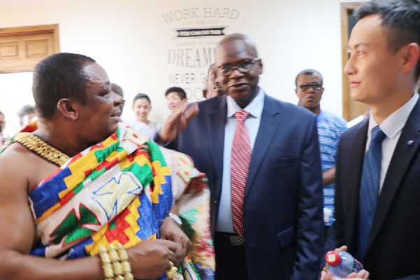 Nana Dr Appiagyei Dankawoso (in kente), Mr Eric Worchie, CEO of E-Tang Group Ghana, and Mr Jeff He, Chairman of E-Tang Group Ghana and Shanghai in a discussion