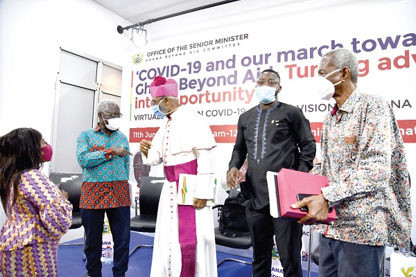 Mr Yaw Osafo-Maafo (left) interacting with Bishop Charles Palmer Buckle after the forum. Also in the picture are Mr Kwame Pianim (right) and Mr Isaac Jay Hyde (2nd right). Picture EBOW HANSON 