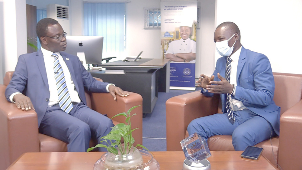 Mr Samuel Sarpong (left), MD, NIB and Mr Maxwell Akalaare Adombila of the Graphic Business during the discussion on Banking & More 