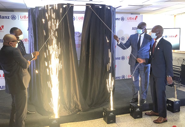 Mr Olalekan Balogun (left), Managing Director of UBA and Mr Darlington Munhuwani of Allianz Insurance launching the partnership