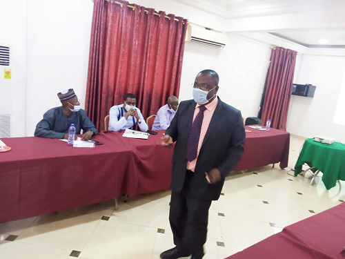 Nana Otuo Acheampong (standing) of the Millenium Financial Centre addressing participants during the Ashanti Region training programme