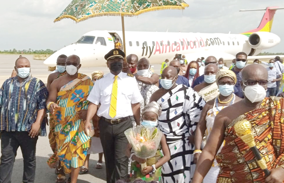 Togbe Afede XIV (in pilot's uniform), in the company of some traditional leaders and dignitaries, after disembarking from the inaugural AWA flight from Accra to Ho• Togbe Afede XIV (in pilot's uniform), in the company of some traditional leaders and dignitaries, after disembarking from the inaugural AWA flight from Accra to Ho