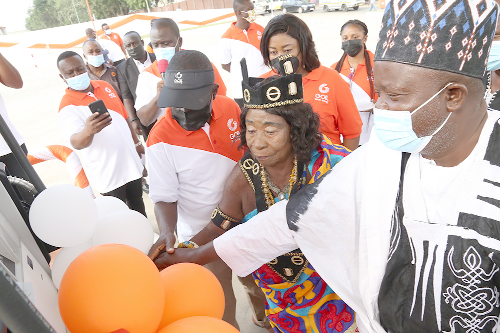 Mr Kwame Osei Prempeh (arrowed), Group CEO/MD of GOIL, with the Zongo Chief and Queen mother of Darkuman cutting the tape to commission the station