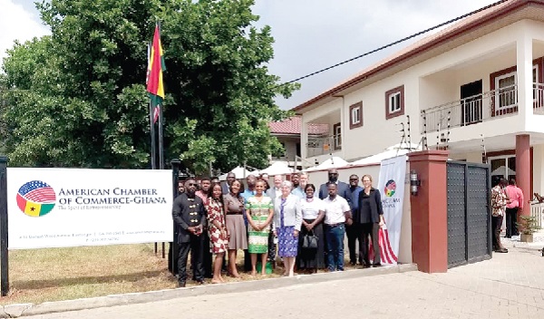 Mrs Stephanie Sullivan (4th from right) joined by executive of AMCHAM  shortly after the official opening of the office