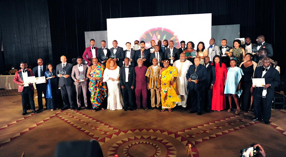 The recipients displaying their awards after the occasion