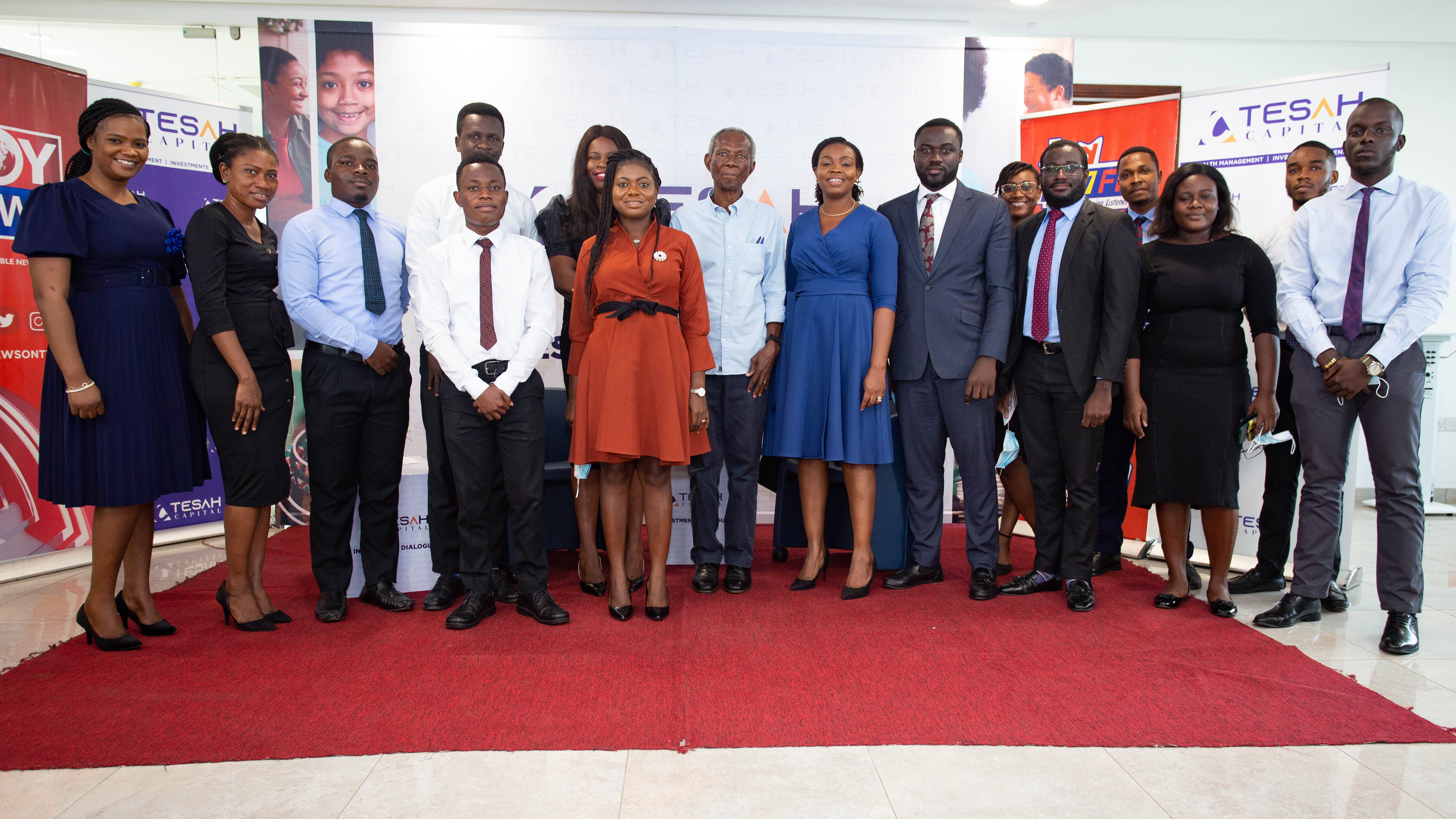 Mr Kwame Pianim,(6th right)Renowned economist, Mrs Eugenia Basheer,(5th right) MD of Tesah Capital, with some management and staff of the company 