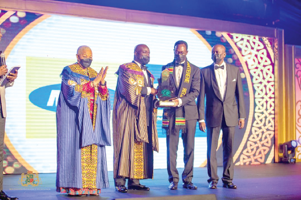 • Mr Selorm Adadevoh  (2nd right), CEO of MTN Ghana, receiving the Business of the Decade award on behalf of the company