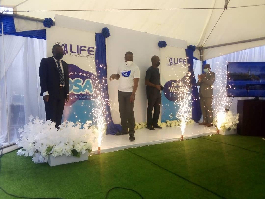 Mr George Kojo Addison (left), MD, Vanguard Life, Mr Michael Kofi Andoh (2nd left), Deputy Commissioner of Insurance, with other senior staff of the company unveiling the new products.