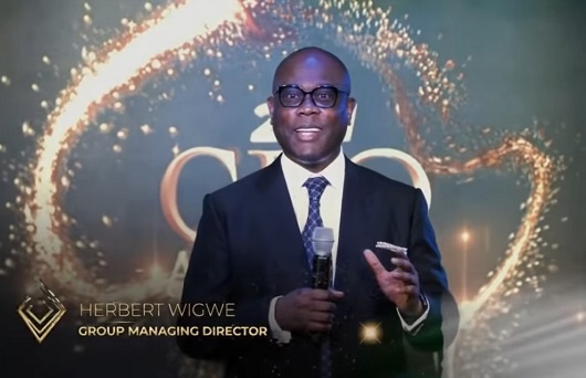 Herbert Wigwe addressing staff during the awards