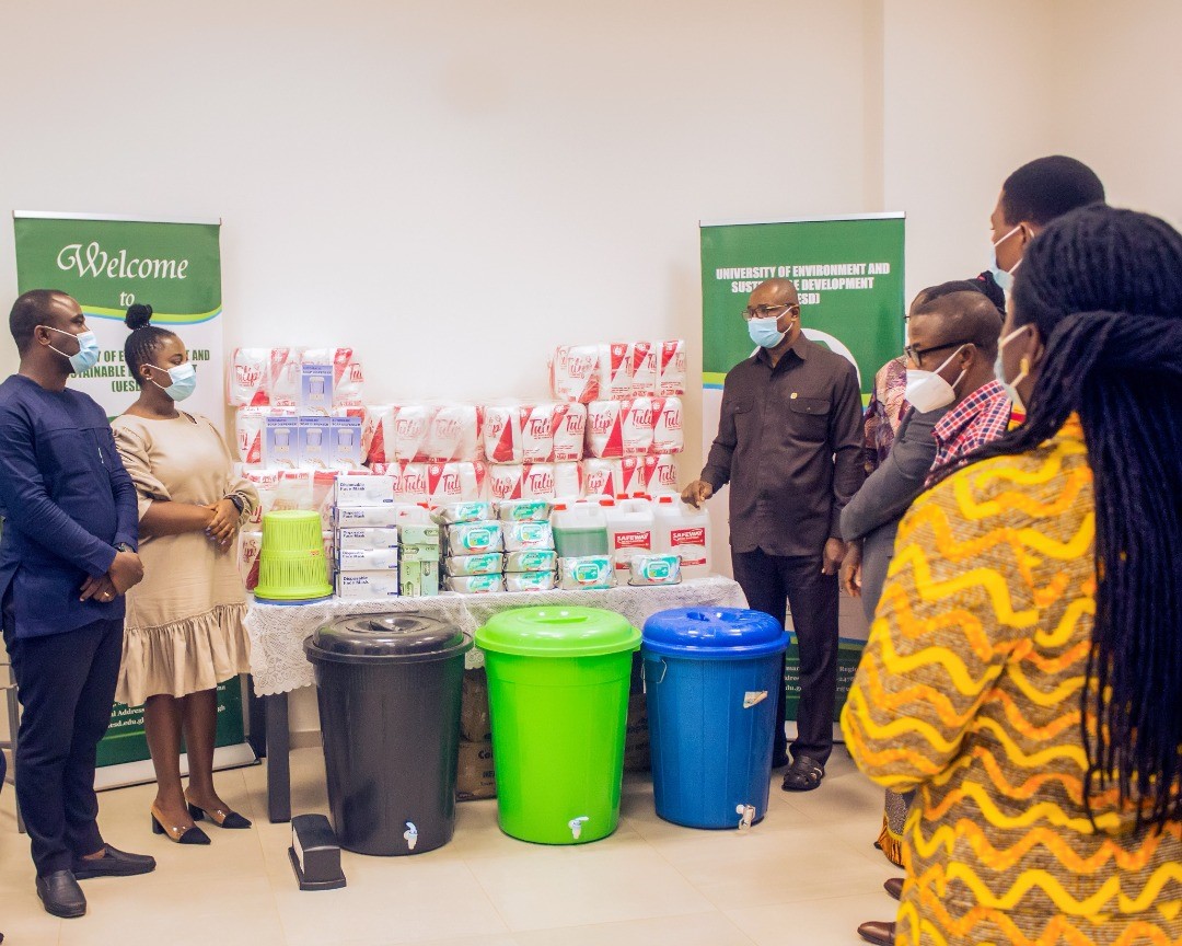 Mr Paul Dowuona (left), Head of Sales, Upfield Ghana, and Mawusi Mawuenyefia (2nd left), Marketing Manager, Upfield Ghana, presenting COVID-19 PPE to Prof. Eric Nyarko-Sampson (3rd left), Vice-Chancellor, UESD