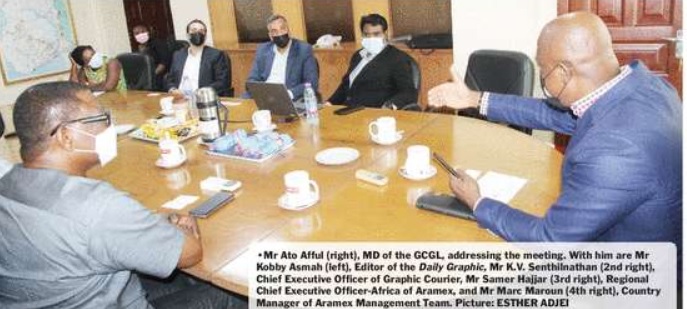 Mr Ato Afful (right), MD of the GCGL, addressing the meeting. With him are Mr Kobby Asmah (left), Editor of the Daily Graphic, Mr K.V. Senthilnathan (2nd right), Chief Executive Officer of Graphic Courier, Mr Samer Hajjar (3rd right), Regional Chief Executive Officer-Africa of Aramex, and Mr Marc Maroun (4th right), Country Manager of Aramex Management Team. Picture: ESTHER ADJEI.