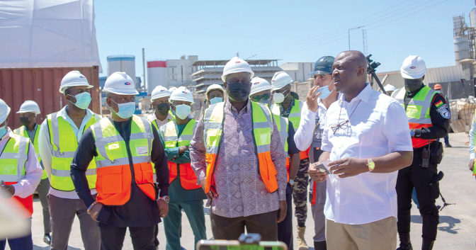 Mr Ibrahim Mahama (right) explaining the factory's production arrangements to Mr Alan Kyerematen (middle), Trade Minister. With them is Nana Phillip Archer (2nd left), MD of Dzata Cement. Picture: DELLA RUSSEL OCLOO