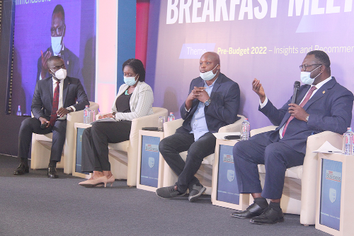 Dr. Abdallah Ali-Nakyea (right), Tax Consultant and Lecturer, School of Law, University of Ghana, making a contribution at the meeting. Other panel members with him are Dr. Randolf Ambala (2nd right), Financial Consultant and Senior Lecturer, GIMPA, Dr. Priscilla Twumasi Baffuor (2nd left), Senior Lecturer, Department of Economics, University of Ghana, and Mr. George Wiafe, Editor, Joy News and Moderator of the event.