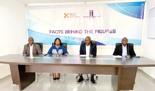 Mr Moukhtar Soalihu (2nd right), Mr Edward Issaka (left) GM, Marketing; Rev. Dr Eugenia Bulley (2nd left), GM, Finance and Administration, and Rev. Kenneth Adza-Awude (right), GM Technical/Operations, addressing shareholders at the event