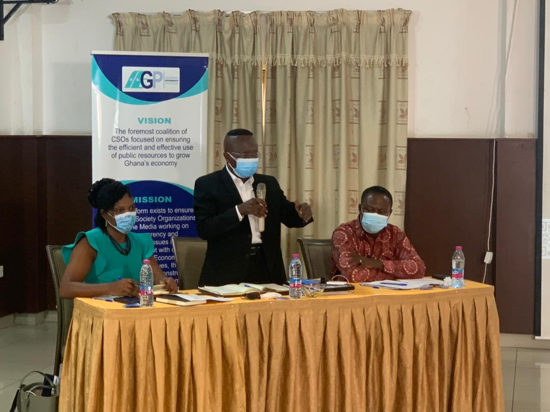 Dr John Kwakye (middle) address the audience at the forum. With him are Mrs Juliet Amoah (left) and Prof. Godfred Charles Ackah (right).