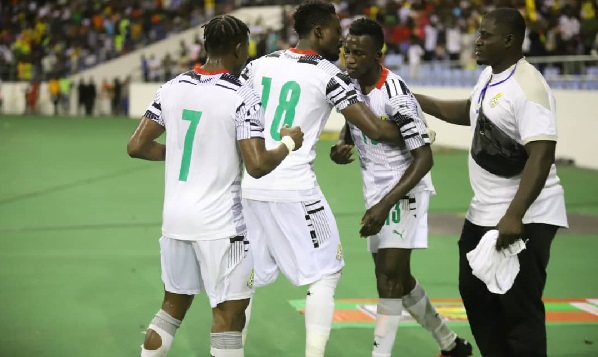 Felix Afena-Gyan (right) being congratulated by his teammates after scoring the opener