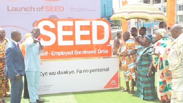 FLASHBACK: Dr John Ofori-Tenkorang (hand raised) making a remark as he is joined by Nana Osei Kwadwo II (4th from right), the Mamensenhene, to unveil the totem of the SEED launch in Kumasi. 