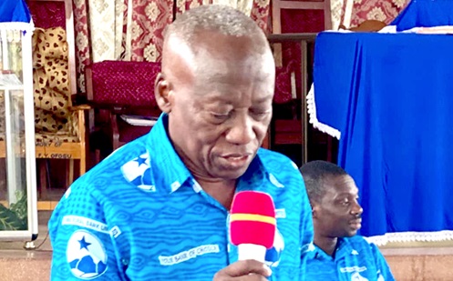 Samuel Adu Addo (left), Chairman of the Board of Directors of the bank, addressing shareholders last Saturday