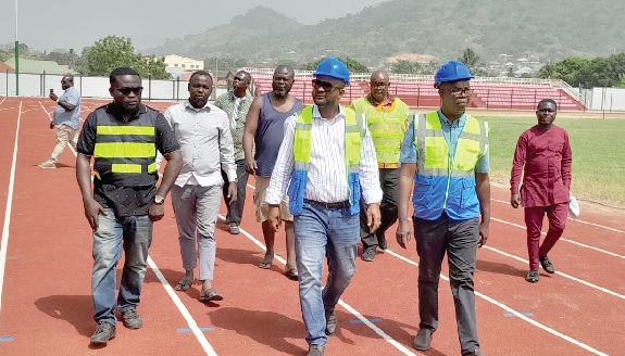 Pius Hadzide leading other officials to inspect the stadium last Friday