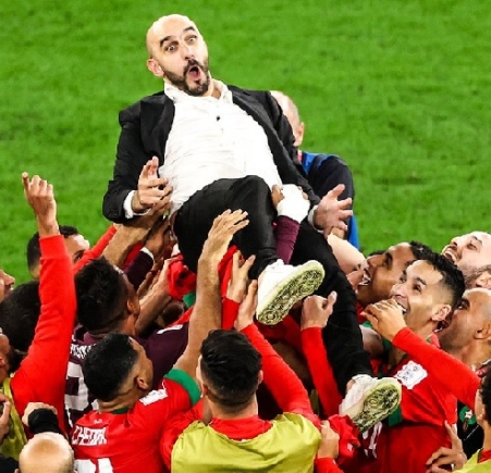 Walid Regragui carried shoulder-high by his players for being first African coach to qualify for World Cup quarter-finals