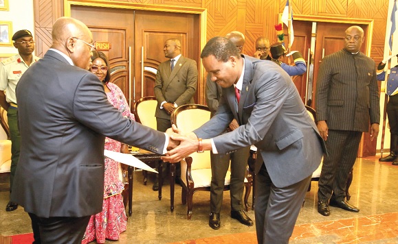 President Akufo-Addo (left) receiving letters of credence from  Teferi Fikre Gossaye, Ethiopian Ambassador to Ghana