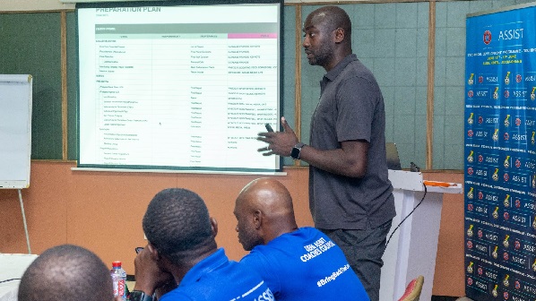 Coach Otto Addo explaining a point to the participants
