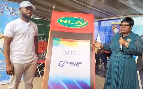 • Mrs Anna Horma Miezeh (right), the Deputy Director-General of NLA, launching the device at the event. With her is Clement Adu-Sarpong (left), the Chief Executive of Blue Star Lotto