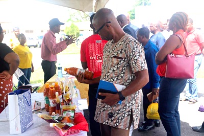 A patron examining a product on display