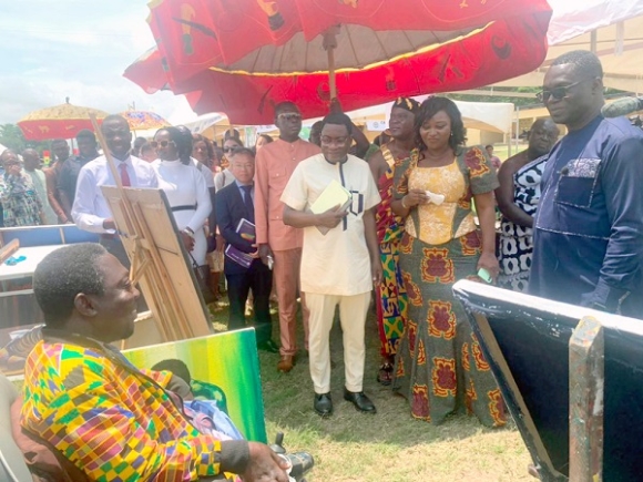 Justina Marigold Assan, Central Regional Minister and Dr John Hawkins Asiedu, Technical Advisor, Ministry of Trade and Industry, with other dignitaries at some of the stands at the opening of the exhibition