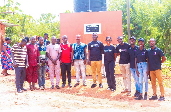 22Bet Ghana officials with some opinion leaders of the community after handing over the water project