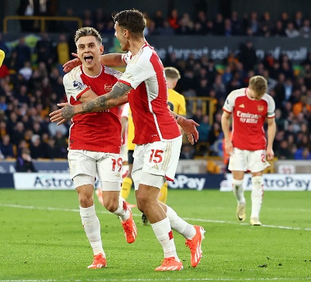 Arsenal players celebrating one of their goals agianst Wolves