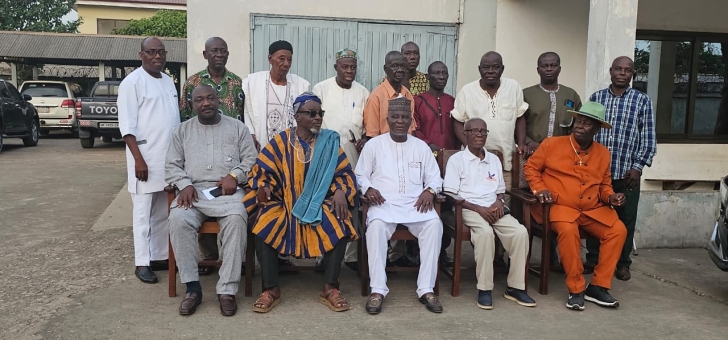 Members of Cocoshe with their President ( seated in a white outfit in the middle)