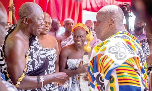 Otumfuo Osei Tutu II (left), Asantehene, interacting with Daasebre Otuo Siriboe II, the Juabenhene, after the thanksgiving service at Juaben. Picture: EMMANUEL BAAH