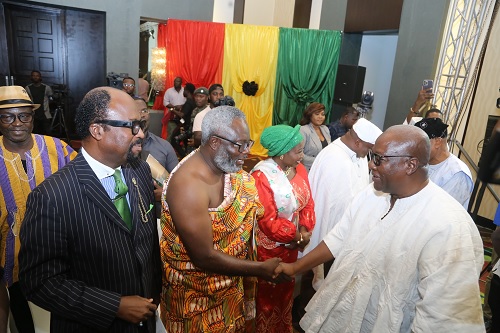  Former President John Dramani Mahama (right) exchanging pleasantries with some flag bearers of political parties at the signing of the Peace Pact in Accra.