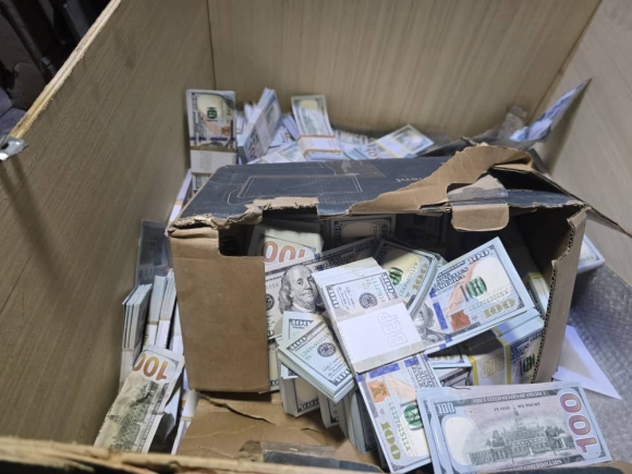 National Security has made a huge bust, seizing a large, unspecified amount of US dollars and Ghana cedis, including counterfeits, hidden in twelve 20ft shipping containers.