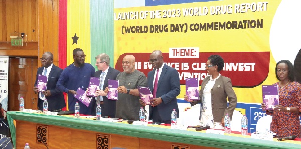 Kenneth Adu-Amanfoh (3rd from right), Director-General, Narcotics Control Commission, being assisted by Charles Ambani (middle), Resident Coordinator, United Nations System in Ghana; Delese Darko (right), Chief Executive Officer, Food And Drugs Authority; Cheikh Toure (2nd from left), Head of the Law Enforcement Section, UNODC Regional Representative for West and Central Africa, and some dignitaries to launch the 2024 World Drug Report in Accra. Picture: ELVIS NII NOI DOWUONA