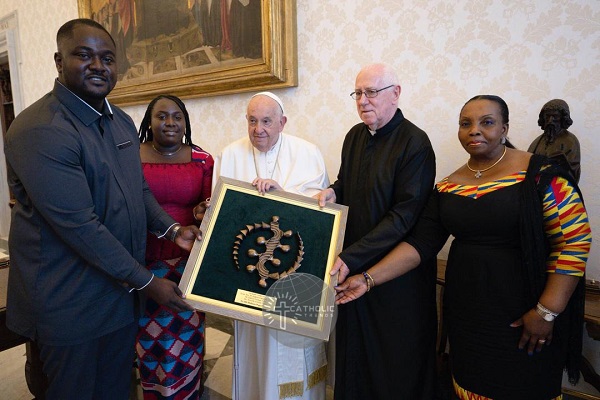 Fr. Andrew Campbell and his team presenting a citation to His Holiness Pope Francis.