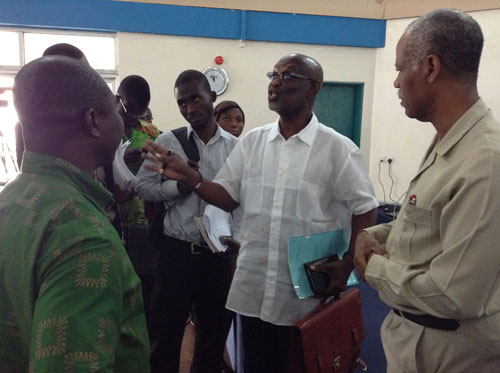 Dr Kwesi Botchwey interacting with some journalists including Editor of the Graphic BUSINESS, Mr Lloyd Evans at the IFEJ/Star Ghana budget forum 