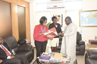 Mrs. Ellen Hagan(left) and Mrs Josephine Ayesu Djan interacting with Mr Ken Ashigbey