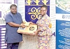Nana Owiredu Wadie I (left), CEO of Kabaka Foundation, presenting the laptop and a power bank to Prof. Nana Aba Appiah Amfo (right), Vice Chancellor, University of Ghana. Picture: ELVIS NII NOI DOWUONA