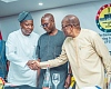  Alban Bagbin (right), Speaker of Parliament, exchanging pleasantries with Mahama Ayariga, Majority Leader of Parliament. With them are Bernard Ahiafor (2nd from right), First Deputy Speaker, and Rockson-Nelson Dafeamekpor (left), Majority Chief Whip