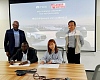  Atta Frimpong Addo (left), the CEO of Ronor Motors, and Nichol Lee, a representative of ROX Motor, signing the agreement at the Corporate Head Office of ROX Motor in Shanghai, China