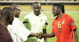 Mr Kofi Iddie Adams, Minister of Sports and Recreation boosts Black Stars' morale at training